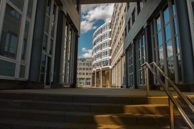 Modern buildings in city against sky