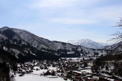 Scenic view of mountains against sky during winter