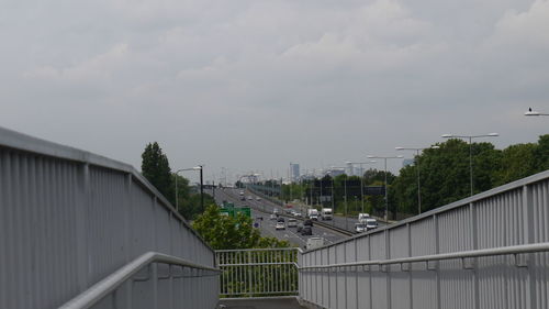 Buildings against cloudy sky