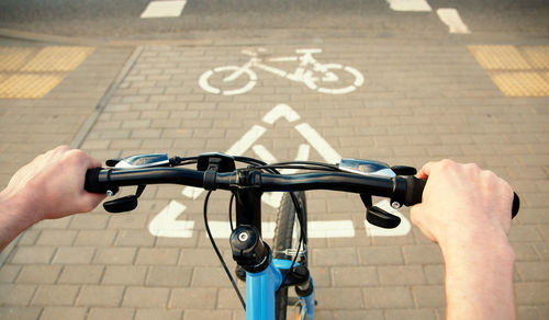 Man riding bicycle on street