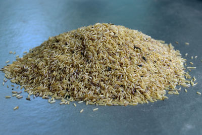 High angle view of rice heap on table