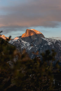 Scenic view of mountains against sky during sunset