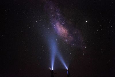 Low angle view of star field against sky at night