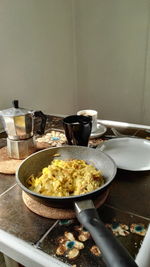 Cooked mashed potatoes in pan on table