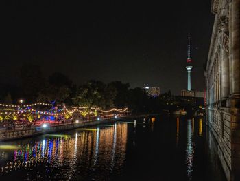 Illuminated buildings at waterfront