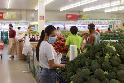 People at market stall