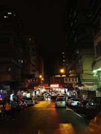 Cars on road at night