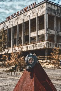 Old abandoned building against sky