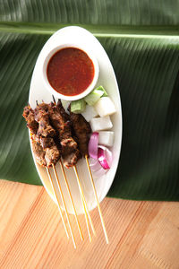 Close-up of food served on table