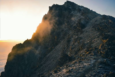 Sunrise above the clouds at mount meru, arusha national park, tanzania