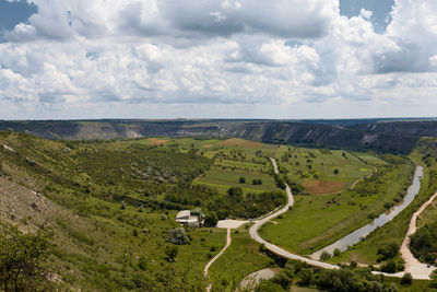 Wide top panoramic view, butuceni canyon in moldova. scenic view of landscape against sky