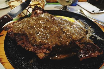 Close-up of meat on barbecue grill