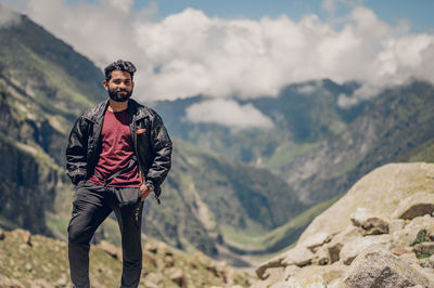 Portrait of man standing on mountain