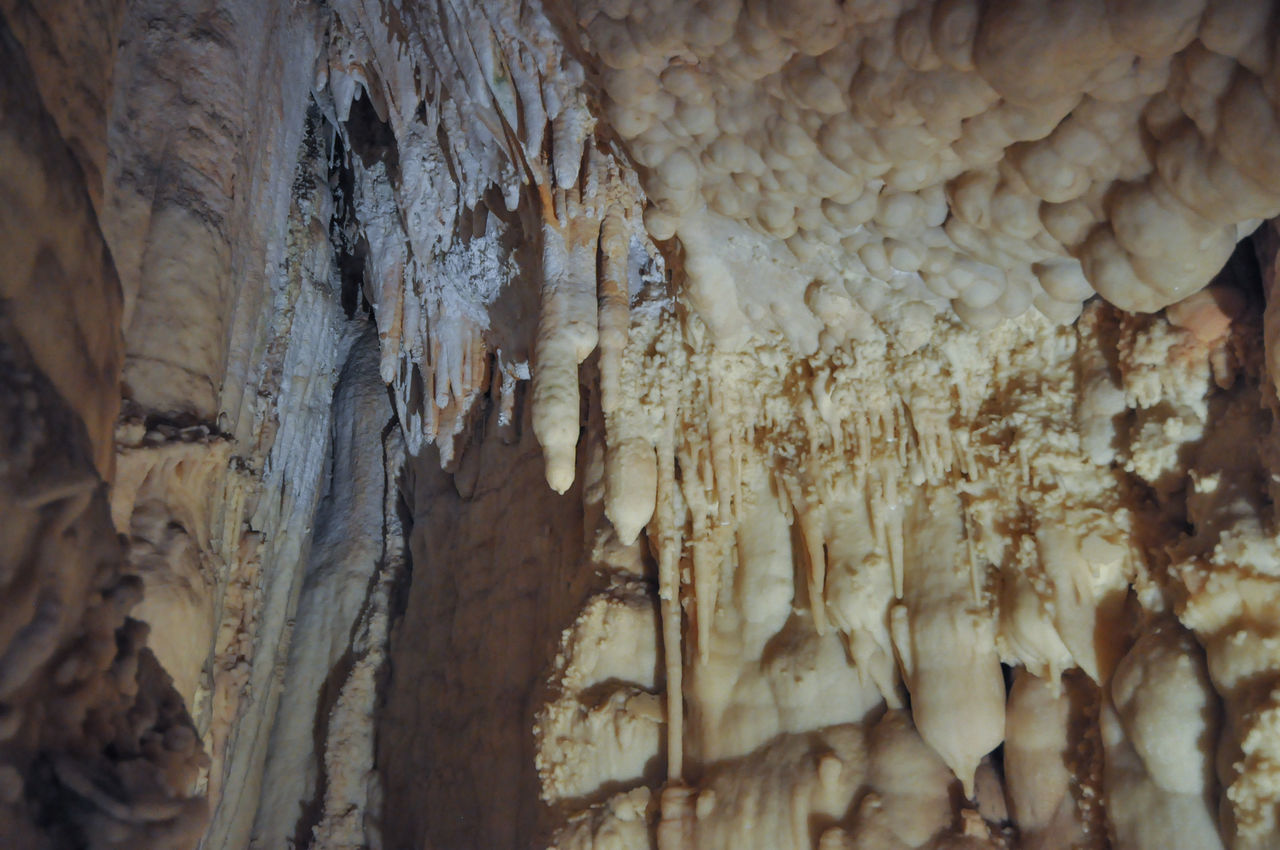 stalactite, speleothem, stalagmite, no people, cave, geology, pattern, nature, indoors, textured, physical geography, rock, rough, beauty in nature, rock formation, low angle view, close-up, day