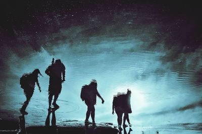 People standing in water