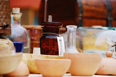 Close-up of containers on table