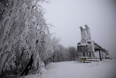 Traditional building against sky during winter