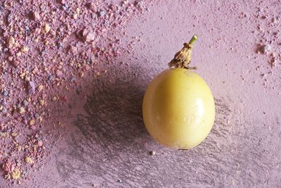 Low angle view of passion fruit laying in chalk dust