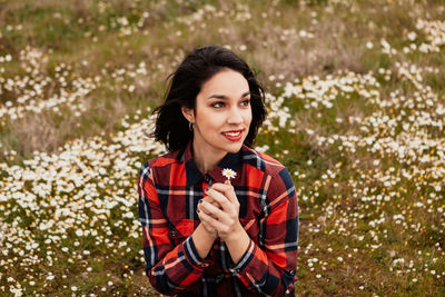 Portrait of young woman smiling