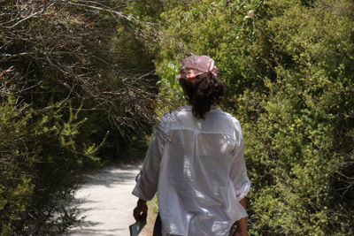 Woman standing on grass