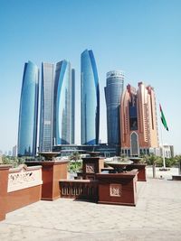 Buildings against clear sky