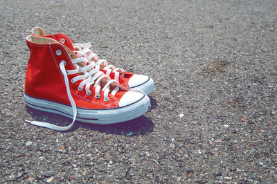 Red shoes on street