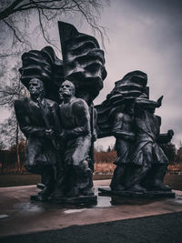 Low angle view of statue against sky