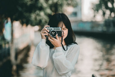 Portrait of man photographing