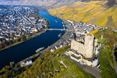 High angle view of river amidst buildings in city