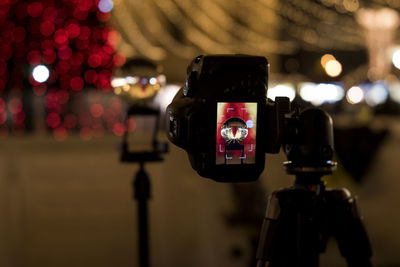 Close-up of camera on tripod with crystal display