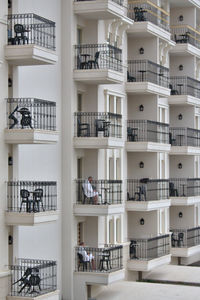 Woman standing in front of building