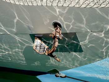 Low angle view of man jumping in sea