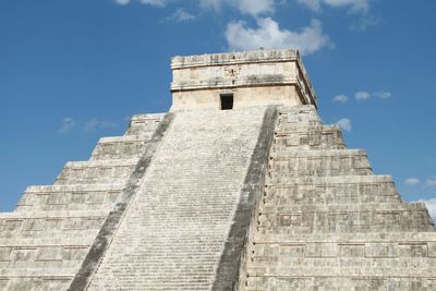 Low angle view of kukulkan pyramid at chichen itza against sky