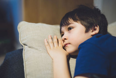 Close-up portrait of boy at home