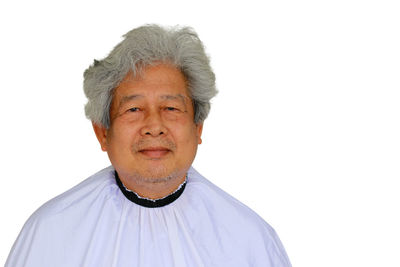 Portrait of man against white background