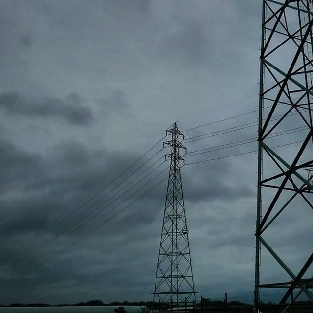 power line, electricity pylon, sky, power supply, low angle view, electricity, cloud - sky, connection, cable, fuel and power generation, cloudy, technology, cloud, built structure, architecture, outdoors, no people, weather, silhouette, nature