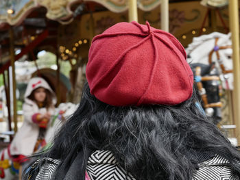 Rear view of woman wearing hat