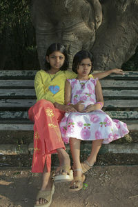 Full length portrait of smiling girl