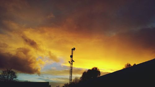 Low angle view of cloudy sky at sunset