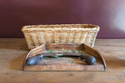 Close-up of wicker basket on table