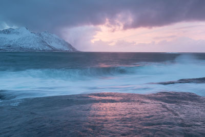 Scenic view of sea against sky during sunset