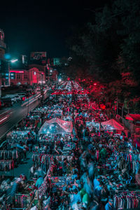 High angle view of crowd on street at night