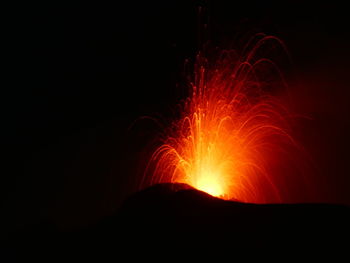 Firework display at night