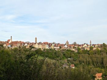 Scenic view of townscape against sky