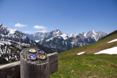 Scenic view of snowcapped mountains against blue sky