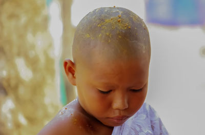 Close-up of boy playing in water