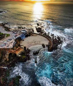 Aerial view of seascape during sunset