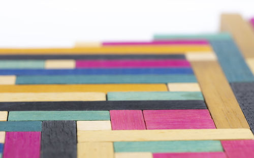 Close-up of multi colored pencils on table