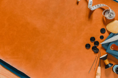 High angle view of orange pencils on table