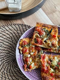 High angle view of pizza served in plate